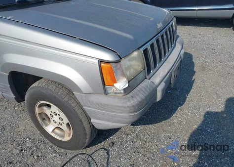 1997 Jeep Grand Cherokee Laredo/Tsi из США, поврежденный, VIN 1J4GZ58S9VC742825